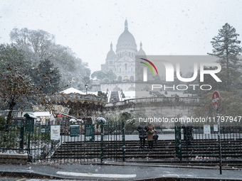 A view of the Basilique du Sacre-Coeur in heavy snowfall as Paris is under the second highest weather warning by the French national weather...