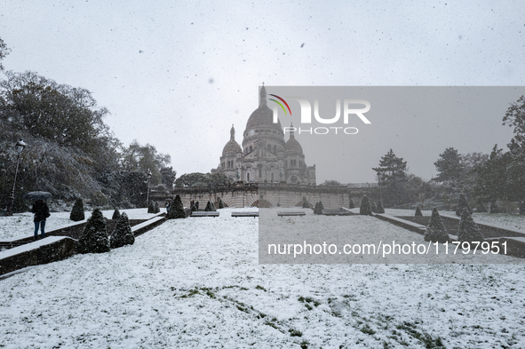 A view of the Basilique du Sacre-Coeur in heavy snowfall as Paris is under the second highest weather warning by the French national weather...