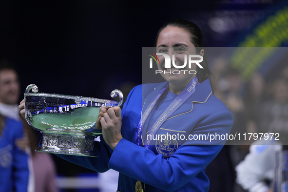 MALAGA, SPAIN - NOVEMBER 20: Elisabetta Cocciaretto of Team Italy leaves the trophy after winning the Billie Jean King Cup Finals at Palacio...