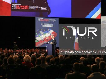 French Prime Minister Michel Barnier delivers a speech during the 106th Mayors Congress organized by the ''France's Mayors' Association'' (A...