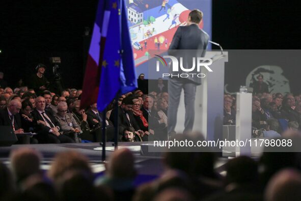 French Prime Minister Michel Barnier, surrounded by his ministers, listens to the speech of Cannes' mayor and AMF president David Lisnard du...