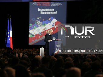 French Prime Minister Michel Barnier delivers a speech during the 106th Mayors Congress organized by the ''France's Mayors' Association'' (A...