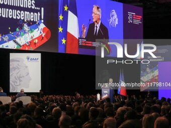 French Prime Minister Michel Barnier delivers a speech during the 106th Mayors Congress organized by the ''France's Mayors' Association'' (A...