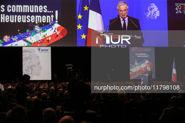 French Prime Minister Michel Barnier delivers a speech during the 106th Mayors Congress organized by the ''France's Mayors' Association'' (A...