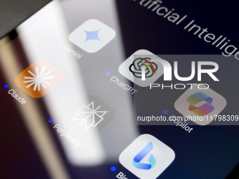 The logos of Google Gemini, ChatGPT, Microsoft Copilot, Claude by Anthropic, Perplexity, and Bing apps are displayed on the screen of a smar...