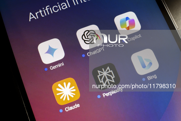 The logos of Google Gemini, ChatGPT, Microsoft Copilot, Claude by Anthropic, Perplexity, and Bing apps are displayed on the screen of a smar...