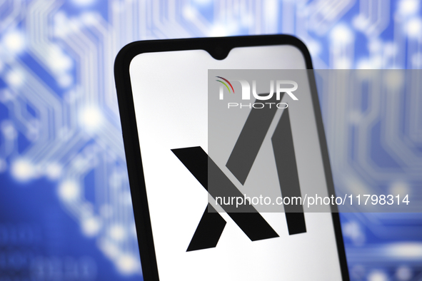 The xAI logo appears on the screen of a smartphone in Reno, United States, on November 21, 2024. 