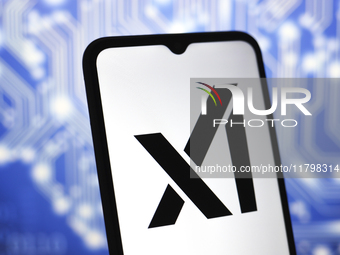 The xAI logo appears on the screen of a smartphone in Reno, United States, on November 21, 2024. (