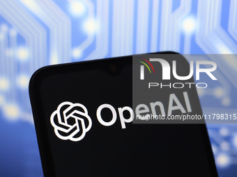 The OpenAI logo appears on the screen of a smartphone in Reno, United States, on November 21, 2024. (