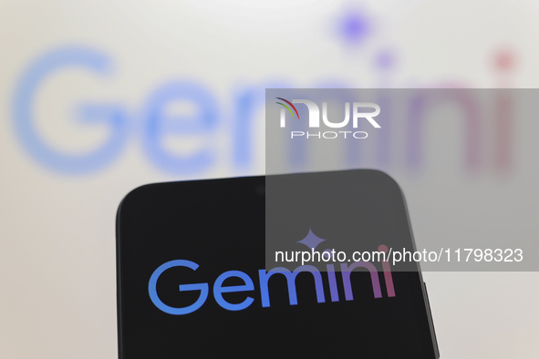 The Google Gemini logo appears on a smartphone screen and in the background on a computer screen in Reno, United States, on November 21, 202...