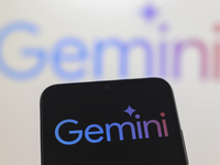 The Google Gemini logo appears on a smartphone screen and in the background on a computer screen in Reno, United States, on November 21, 202...