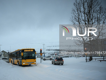 A bus drives along one of the main streets in Akureyri, Iceland, on November 20, 2024. (