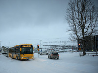 A bus drives along one of the main streets in Akureyri, Iceland, on November 20, 2024. (