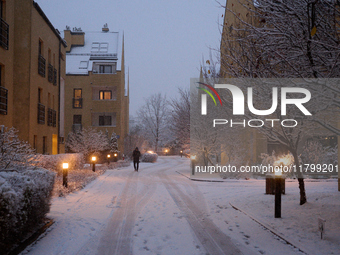 Snow is seen falling in a residential neighbourhood in Warsaw, Poland on 22 November, 2024. It is the first time in recent years significant...