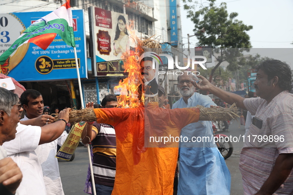 Supporters of India's main opposition Congress party participate in a protest rally against the Indian billionaire businessman Gautam Adani...