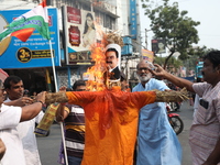 Supporters of India's main opposition Congress party participate in a protest rally against the Indian billionaire businessman Gautam Adani...