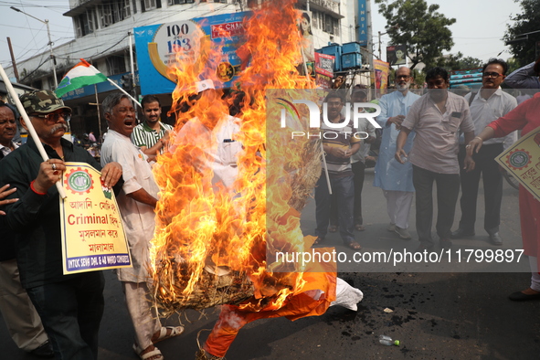 Supporters of India's main opposition Congress party participate in a protest rally against the Indian billionaire businessman Gautam Adani...