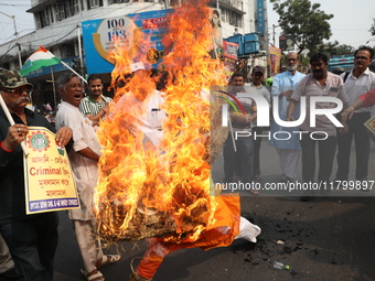 Supporters of India's main opposition Congress party participate in a protest rally against the Indian billionaire businessman Gautam Adani...