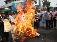 Supporters of India's main opposition Congress party participate in a protest rally against the Indian billionaire businessman Gautam Adani...