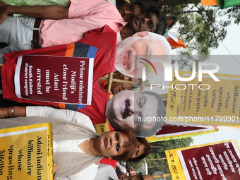 Supporters of India's main opposition Congress party participate in a protest rally against Indian Prime Minister Narendra Modi and billiona...