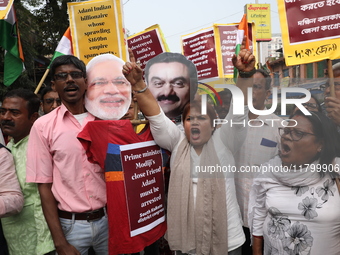 Supporters of India's main opposition Congress party participate in a protest rally against Indian Prime Minister Narendra Modi and billiona...