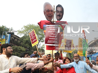 Supporters of India's main opposition Congress party participate in a protest rally against Indian Prime Minister Narendra Modi and billiona...