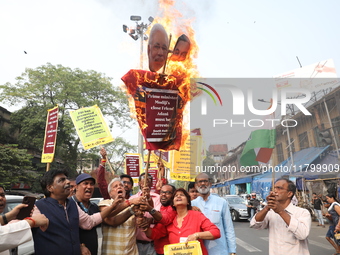 Supporters of India's main opposition Congress party participate in a protest rally against Indian Prime Minister Narendra Modi and billiona...