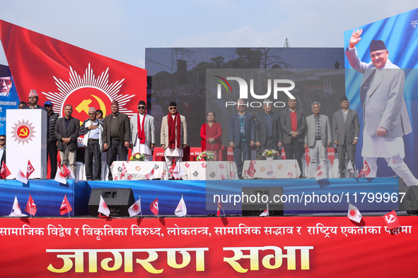 Nepal Prime Minister and chairman of CPN-UML (Communist Party of Nepal- Unified Marxist Leninist) KP Sharma Oli (sixth from left) stands alo...