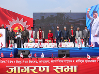 Nepal Prime Minister and chairman of CPN-UML (Communist Party of Nepal- Unified Marxist Leninist) KP Sharma Oli (sixth from left) stands alo...