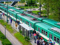 Passengers gather at the Mupa-Nemzeti Szinhaz suburban train station in Budapest, Hungary, on May 19, 2023. This station, adjacent to cultur...