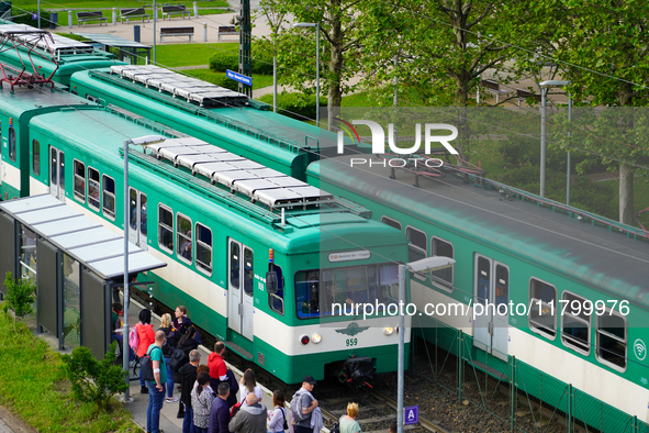 Passengers queue to board the suburban train at the Mupa-Nemzeti Szinhaz station in Budapest, Hungary, on May 19, 2023. The station is locat...