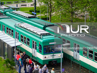 Passengers queue to board the suburban train at the Mupa-Nemzeti Szinhaz station in Budapest, Hungary, on May 19, 2023. The station is locat...