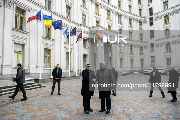 Ukraine's Foreign Minister Andrii Sybiha and Czech Republic's Foreign Minister Jan Lipavsky shake hands before a joint press conference in K...