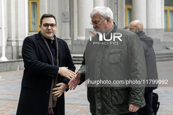 Ukraine's Foreign Minister Andrii Sybiha and Czech Republic's Foreign Minister Jan Lipavsky shake hands before a joint press conference in K...