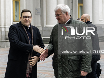 Ukraine's Foreign Minister Andrii Sybiha and Czech Republic's Foreign Minister Jan Lipavsky shake hands before a joint press conference in K...