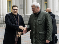 Ukraine's Foreign Minister Andrii Sybiha and Czech Republic's Foreign Minister Jan Lipavsky shake hands before a joint press conference in K...