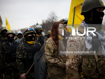 A anti-government protester woman take part in demonstration on Maidan square in Kiev on February 14, 2014. Russia will release the next ins...