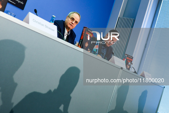 Author Klaus-Rudiger Mai and journalist Uwe Telkamp present the book 'Angela Merkel - Between Legend and Reality' at a press conference in B...