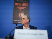 Author Klaus-Rudiger Mai presents his book 'Angela Merkel - Between Legend and Reality' at a press conference in Berlin, Germany, on Novembe...