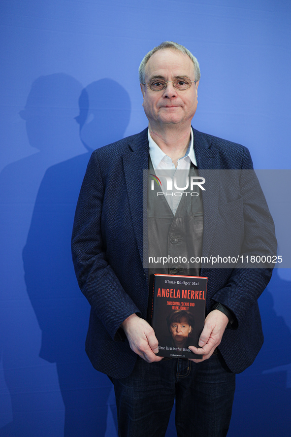 Author Klaus-Rudiger Mai presents his book 'Angela Merkel - Between Legend and Reality' at a press conference in Berlin, Germany, on Novembe...