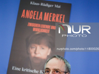 Author Klaus-Rudiger Mai presents his book 'Angela Merkel - Between Legend and Reality' at a press conference in Berlin, Germany, on Novembe...