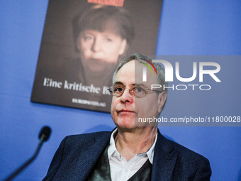 Author Klaus-Rudiger Mai presents his book 'Angela Merkel - Between Legend and Reality' at a press conference in Berlin, Germany, on Novembe...