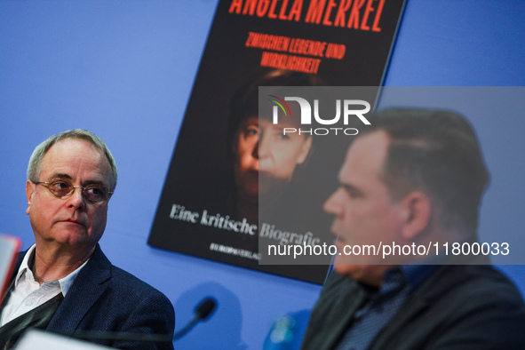 Author Klaus-Rudiger Mai and journalist Uwe Telkamp present the book 'Angela Merkel - Between Legend and Reality' at a press conference in B...