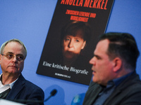 Author Klaus-Rudiger Mai and journalist Uwe Telkamp present the book 'Angela Merkel - Between Legend and Reality' at a press conference in B...