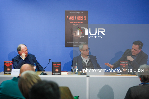 Publisher Christian Strasser, author Klaus-Rudiger Mai, and journalist Uwe Telkamp present the book 'Angela Merkel - Between Legend and Real...