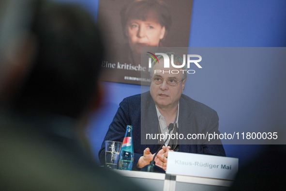 Author Klaus-Rudiger Mai presents his book 'Angela Merkel - Between Legend and Reality' at a press conference in Berlin, Germany, on Novembe...