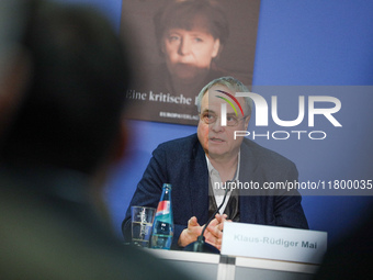 Author Klaus-Rudiger Mai presents his book 'Angela Merkel - Between Legend and Reality' at a press conference in Berlin, Germany, on Novembe...