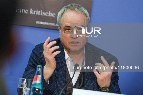 Author Klaus-Rudiger Mai presents his book 'Angela Merkel - Between Legend and Reality' at a press conference in Berlin, Germany, on Novembe...