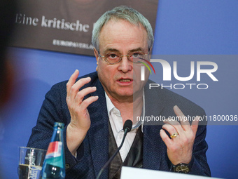 Author Klaus-Rudiger Mai presents his book 'Angela Merkel - Between Legend and Reality' at a press conference in Berlin, Germany, on Novembe...