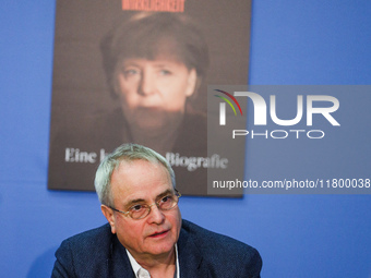 Author Klaus-Rudiger Mai presents his book 'Angela Merkel - Between Legend and Reality' at a press conference in Berlin, Germany, on Novembe...